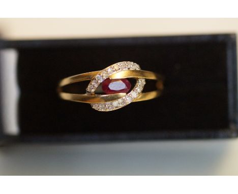 9ct gold ring set with ruby and diamonds