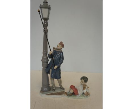 Lladro Lamp Lighter (46cm h) together with a Lladro Boy and Puppy 