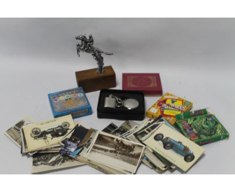 A BOX OF COLLECTABLES TO INCLUDE PLAYING CARDS, POST CARDS, BOXED HIP FLASK, PAGE TURNER, ETC