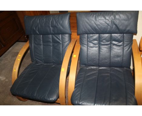A PAIR OF MODERN LOUNGE CHAIRS TOGETHER WITH A STOOL 