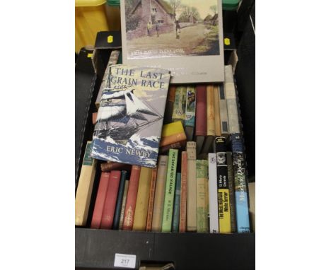 A BOX OF GENERAL BOOKS TO INCLUDE FIRST EDITION OF THE LAST GRAIN RACE BY ERIC NEWBY AND A VILLAGE LOST AND FOUND BY BRIAN MA