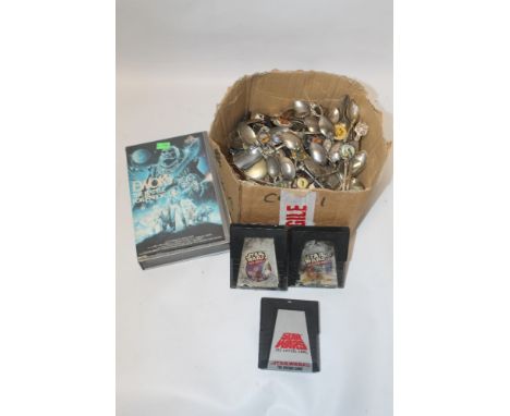 A LARGE QUANTITY OF ASSORTED COLLECTORS SPOONS, TOGETHER WITH THREE VINTAGE STAR WARS ATARI GAMES AND AN EWOKS VHS VIDEO, ETC