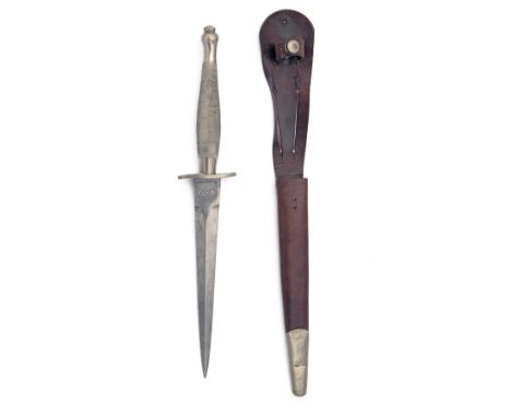 WILKINSON SWORD, LONDON A RARE MKI FAIRBAIRN-SYKES DAGGER 1941/42, with needle-form double-edged 6 3/4in. blade (some light c