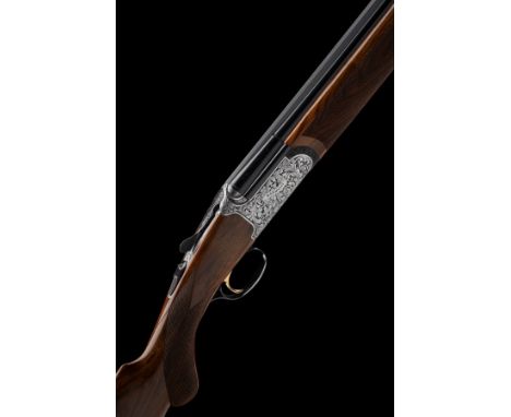 RIZZINI A VIRTUALLY UNUSED 28-BORE 'ROUND BODY' SINGLE-TRIGGER OVER AND UNDER EJECTOR, serial no. 88988, for 2014, 28in. nitr