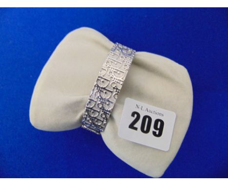 A Christian Dior bangle