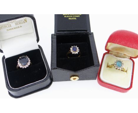 THREE BOXED GOLD RINGS comprising 18ct gold sapphire & diamond cluster ring, 9k gold cluster dress ring, and a 9ct gold sapph