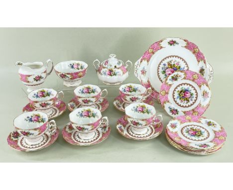 ROYAL ALBERT 'LADY CARLYLE' TEA SERVICE FOR SIX, comprising milk jug, preserve jar and cover, sugar bowl, bread & butter plat