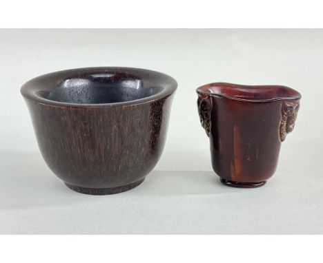 TWO SMALL IMMITATION RHINO HORN CHINESE VESSELS, comprising bowl, spurious 4-character mark, 9.5cms diam., and a shallow oval