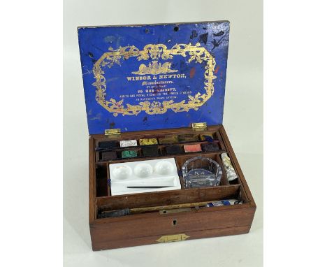 WINDSOR & NEWTON MAHOGANY ARTIST'S PAINT BOX, 19th century, hinged cover with gilt printed label, fitted compartments & lift-