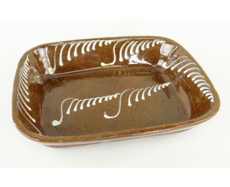 SLIPWARE POTTERY BAKING DISH, possibly Sunderland, rectangular with repeated tapering S-motif, unmarkedComments: good overall