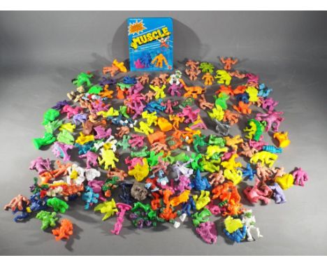 Mattel - In excess of 100 predominately MUSCLE figures by Mattel including a sealed MUSCLE 4 figure pack with a Clear blister