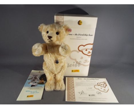 Steiff - a Steiff teddy bear entitled Anna, The friendship bear issued in a limited edition #1307 with gold coloured button i