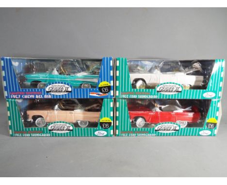 Four diecast model American classic cars by Gearbox Collectibles to include three 1956 Thunderbirds and a 1957 Chevy Bel Air,