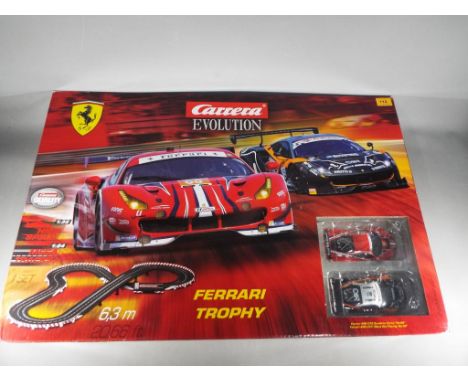 Carrera Evolution Ferrari Trophy twin car model high speed road race set with 6.3 metres of track # 20025230, mint ex retail 