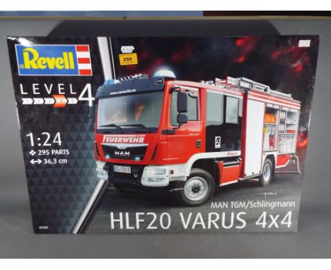 Revell - MAN TGM/Schlingmann HLF20 Varus 4x4  1:24 scale Level 4 model #07452, 295 parts, toy appears factory sealed and unus