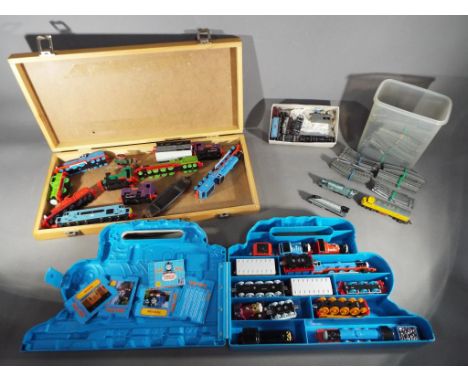 A quantity of Lone Star Locos and track and a Thomas The Tank Engine 'Take Along' carry case containing trains and coaches.