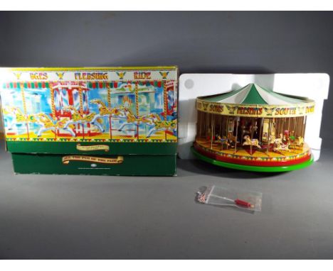 Corgi - A 1:50 scale Corgi Fairground Attractions model # CC20401 'The South Down Gallopers', model appears NM in E original 