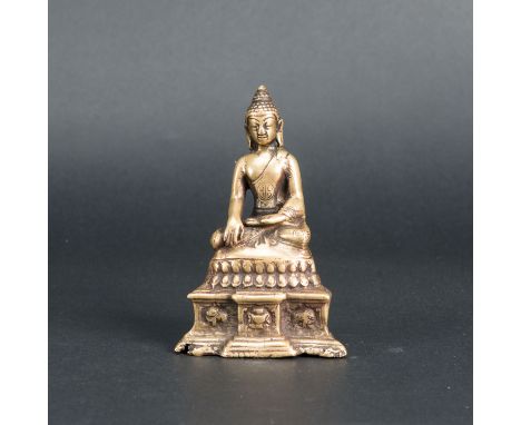 Indochinese Budha, bronze sculpture polished in sitting pose on integrated base. 19Th Century. 11 cm high.