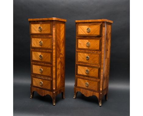 Pair of French Louis XVI pillar dressers, each on four curved legs with outsawed ornaments on the lower border, 5 drawers wit