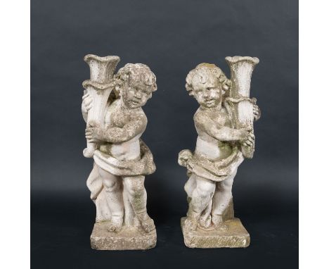 Pair of Garden Angels, each in standing position with horn, possibly for lamp mount. Portland stone around 1900. A pair, 81 c