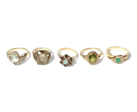 Three 9 carat gold gem set dress rings, finger sizes L, Q1/2 and R; together with an sapphire and opal dress ring, stamped '9