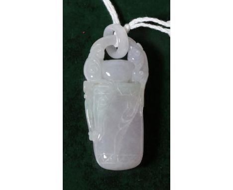 A lavender jade carving, measures 5cm by 2.5cm.  Gross weight - 20.17 grams. 