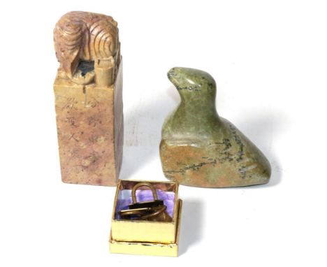 A Chinese soapstone seal with elephant knop, and a set of four Japanese inlaid menu holders, and a Northwest Coast soapstone 