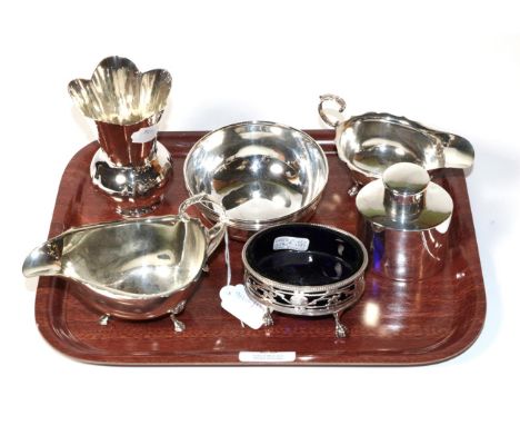 A group of silver items, comprising: two sauce boats, Birmingham 1927 and 1937; a small tea caddy, Birmingham 1910; a George 