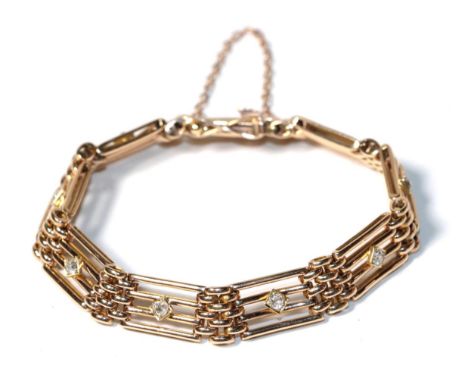 A gate link bracelet with clasp stamped '15ct', length 19cm.  Gross weight - 17.1 grams. 