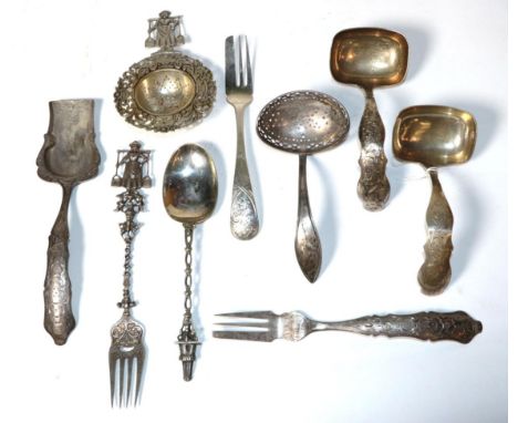 A group of 19th Century and later Dutch silver serving flatware, to include a pair of unusual sauce ladles with rectangular b