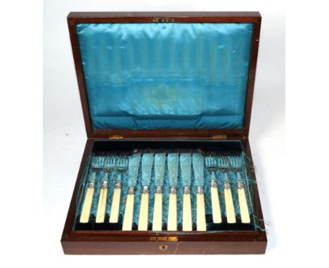 Twelve pairs of Victorian silver fish knives and forks, John Edward Bingham, (Walker &amp; Hall), Sheffield, 1882, with ivory