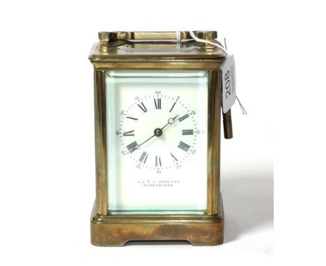 A striking brass carriage clock, with white enamel dial, retailed by ''C.H. &amp; C. Cowland, Sunderland'' 