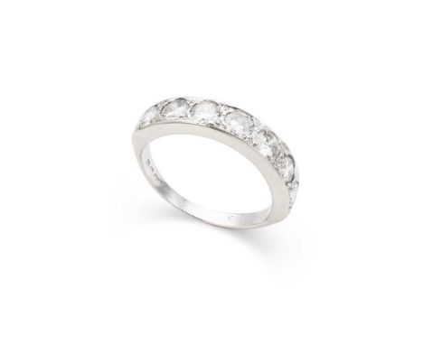 A diamond half-eternity ring set with seven round brilliant-cut diamonds, modelled in 18ct goldDimensions:Ring size: J/K