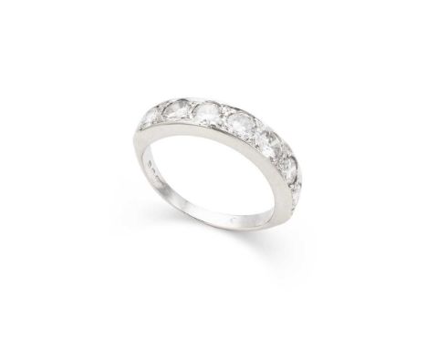 A diamond half-eternity ring set with seven round brilliant-cut diamonds, modelled in 18ct goldDimensions:Ring size: J/K