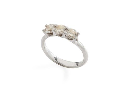 A diamond three-stone ring claw-set with three round brilliant-cut diamonds, modelled in platinumDimensions:Ring size: K