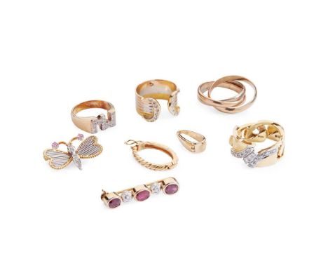 A collection of jewellery including a ruby and diamond butterfly brooch, stamped 18k 750; a diamond tri-coloured double-C rin