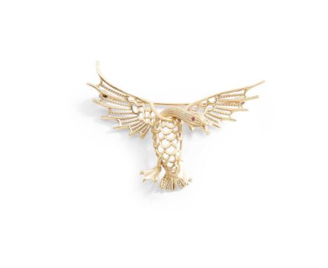 A novelty bird brooch modelled as a goose with pierced detail and round-cut ruby eyes, modelled in 18ct goldDimensions:Width: