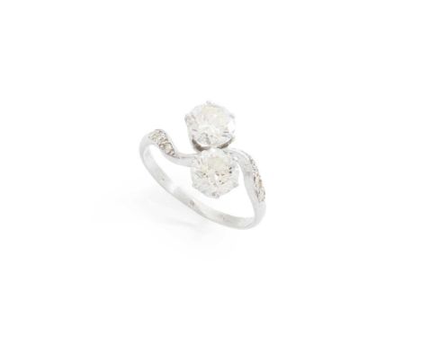 A diamond two-stone 'Toi et Moi' ring claw-set with two round brilliant-cut diamonds, each shoulder set with three eight-cut 