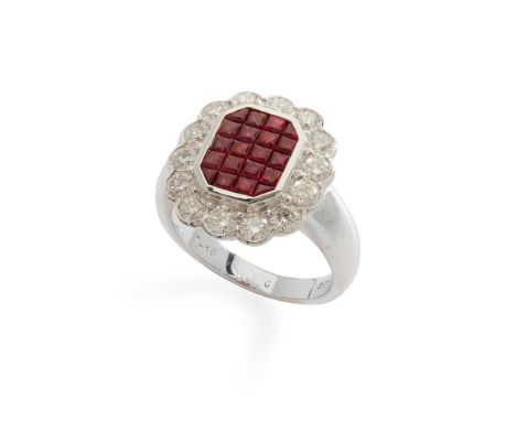 A ruby and diamond cluster ring set with a cluster of princess-cut rubies in a border of round brilliant-cut diamonds, modell