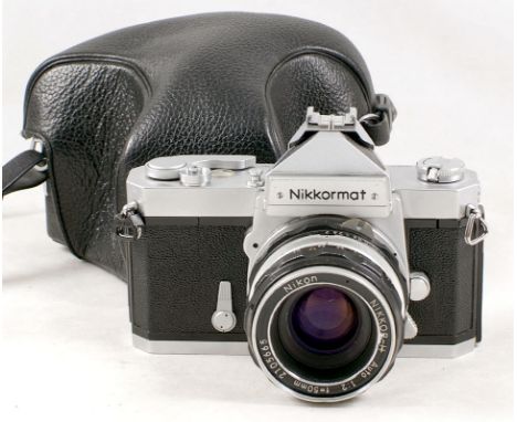 Early Nikkormat FS camera #7400571 circa 1965 (condition 5F) with fitted f2 Nikkor-H 50mm lens #2105665 (condition 6F) and cl