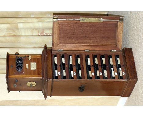 Uncommon, early version Taxiphote table-top stereo viewer on free standing pedestal. Circa 1900, with approx 1,200+ glass ste