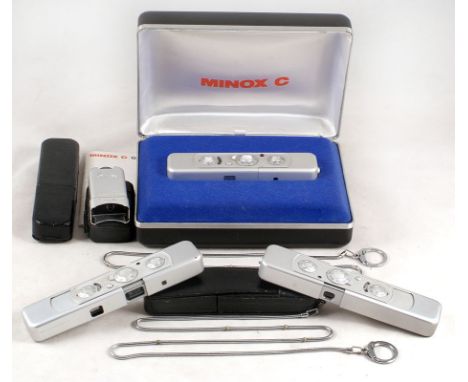 3 Minox C Sub-miniature cameras. One in presentation box with case, flash & measuring chain & German instruction book. (No ba