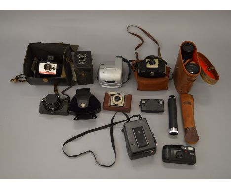 Polaroid Cameras & Optical Collection. 3 Polaroid cameras, including uncommon Spirit 600L, Praktica and other vintage cameras