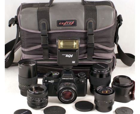 Praktica BX20 Kit. BX20 35mm camera with fitted 50mm f1.8 Pentacon MC lens (condition 5F); BD24 flash; 28mm f2.8 Prakticar le