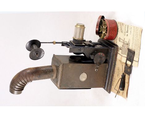 Early Tin Cine Projector.  Early oil lamp powered cine projector for continuous loop films (no oil burner, otherwise conditio