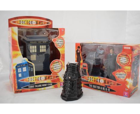 Doctor Who figurines, to include: Tardis talking money bank, boxed; Dr Who & RC K-9; and a ceramic Dalek egg cup.