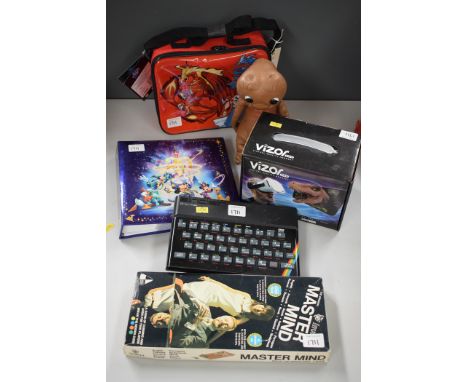 A ZX Spectrum game console; together with collectables, to include: a Virtual Reality head set; a Beyblade lunch box; and sun