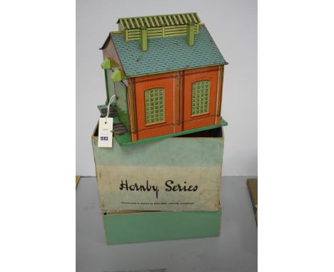 A Horny 0-gauge by No. E1E engine shed, boxed.