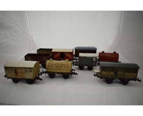 Bing 0-gauge rolling stock, to include: a milk traffic wagon 7419; refrigerator van; oil wagons for BP and Shell; explosives 