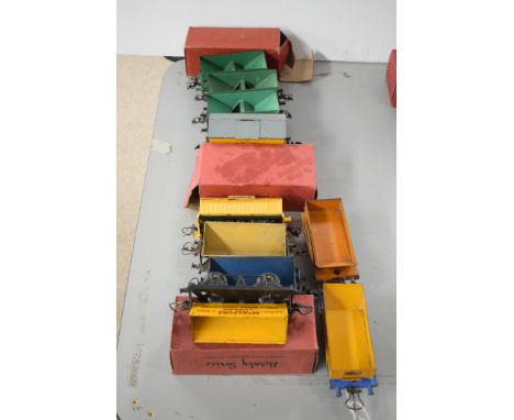 Hornby 0-gauge rolling stock, to include: four hopper wagons, one boxed; three side tipper wagons; two bend tipper wagons; tw